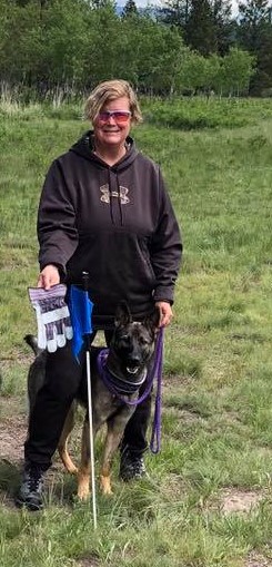 Chelle Schumann tracking with her dog